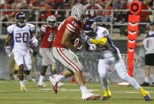 After a catch, UNLV tight end Jake Phillips prepares for a hit from defensive back Dallas Nichols. Phillips would score from 27 yards out.