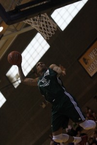 Sam Johnson (Legacy) rises high for a dunk during the first week of action at the Desert Reign ProCity League over the summer.