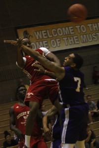 UNLV senior Kevin Olekaibe (Cimarron-Memorial) dishes the basketball during the second week of action at the Desert Reign ProCity League over the summer.