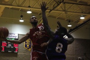 P’Allen Stinett (Palo Verde) glides to the basketball for a layup during the second week of action at the Desert Reign ProCity League over the summer.