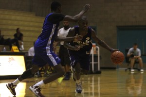 Former UNLV Rebel Marcus Lawrence (Bishop Gorman) drives to the basket during the final week of action at the Desert Reign ProCity League over the summer.