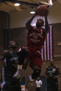 Hank Thorns (Valley) drives down the lane for layup during the final week of action at the Desert Reign ProCity League over the summer.