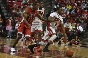 UNLV senior Kevin Olekaibe leads the break for the Gray team during the first half of the scrimmage.