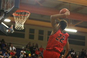 Findlay Prep's Kelly Oubre rises high for a slam against the Best of Las Vegas Saturday night. 