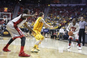 UNLV guard Deville Smith surveys his offensive options in the second half of UNLV's MWC quarterfinal game against Wyoming.